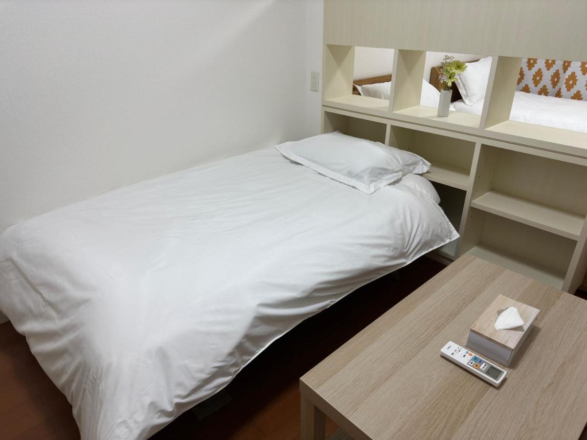 Ferienwohnung Soubi Minpaku Ōsaka Exterior foto